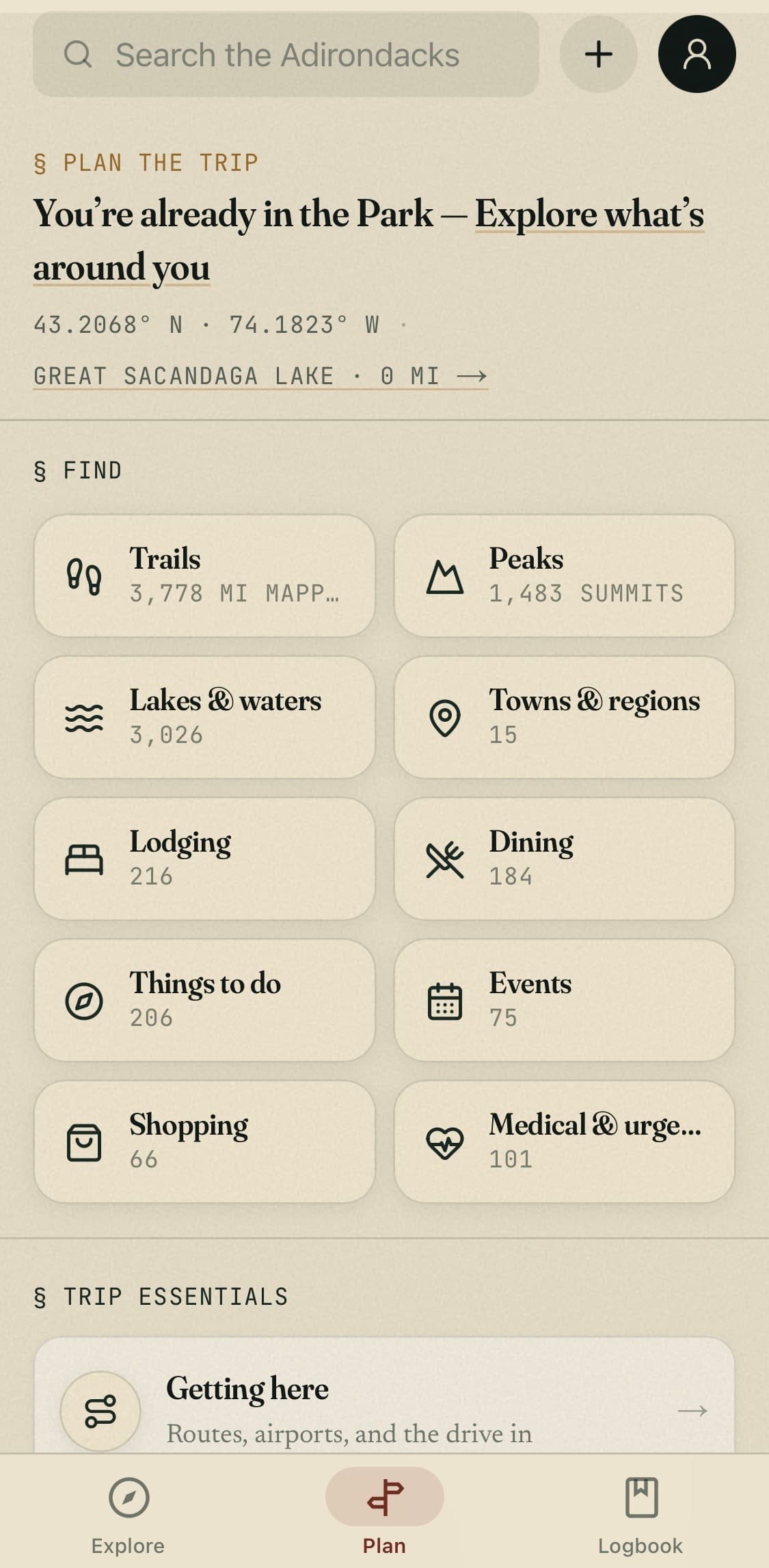 The app's Plan tab: a trip-planning hub with cards for trails, peaks, lakes, towns, lodging, dining, things to do, events, shopping, and medical — plus a Getting Here guide.